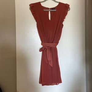 Coral color medium Flowey short ruffle sleeve dress with tie belt size medium